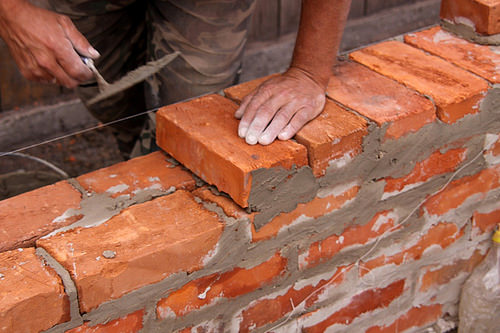 laying bricks photo