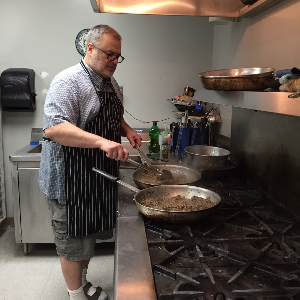 John Lasiter cooking mushrooms