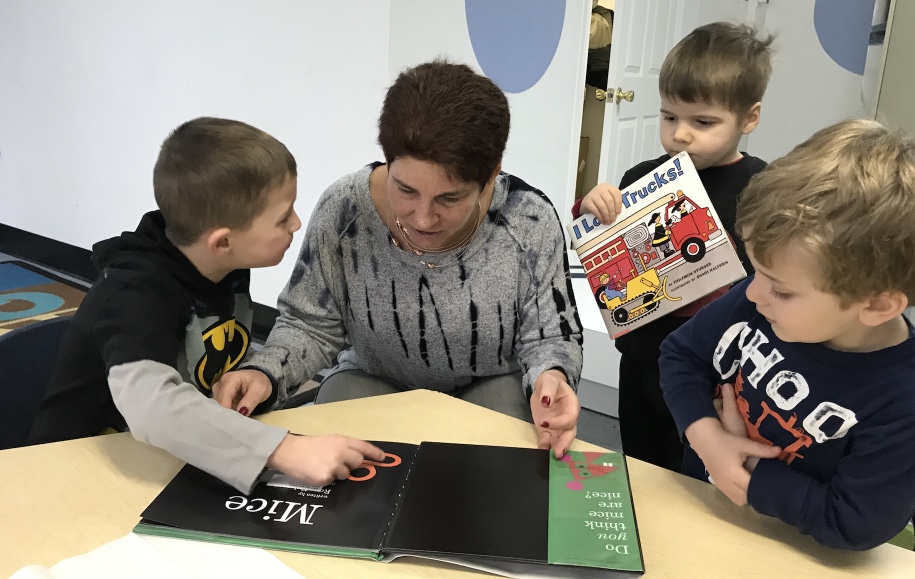 President Fern Heinig visiting preschoolers at their temporary "digs".